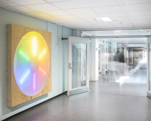 “Continuum” Commission, Nørre Gymnasium High School, Copenhagen, 2025. 70 meter wall painting, five lightboxes with LED and watercolor paintings and colored light. Photo by Mogens Ulderup.