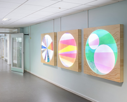 “Continuum” Commission, Nørre Gymnasium High School, Copenhagen, 2025. 70 meter wall painting, five lightboxes with LED and watercolor paintings and colored light. Photo by Mogens Ulderup.