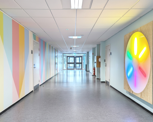 “Continuum” Commission, Nørre Gymnasium High School, Copenhagen, 2025. 70 meter wall painting, five lightboxes with LED and watercolor paintings and colored light. Photo by Mogens Ulderup.